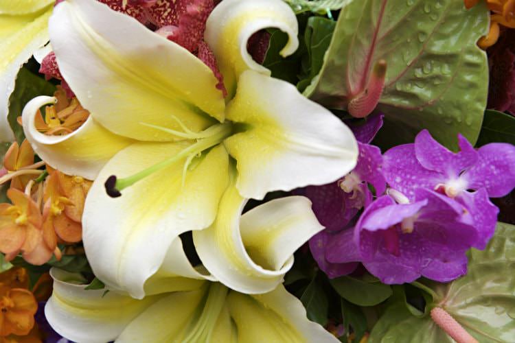 A bundle of different flowers including White Lily